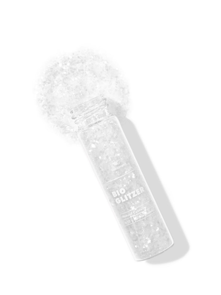 Weisser Bioglitzer Naturkosmetik Snow Flake 10 Gramm vor weißer Wand 