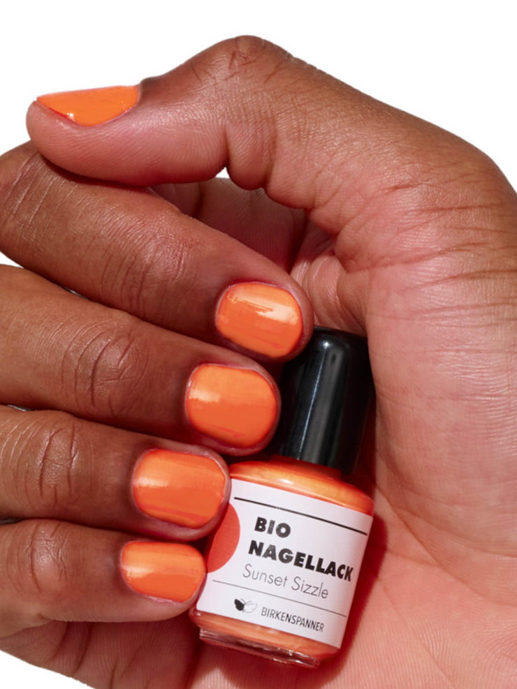 Knalliger pflanzenbasiert Nagellack in orange mood 